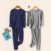 Invierno 2025 Nuevo Traje de Ropa Interior para Hombres y Mujeres Ropa y Pantalones de Otoño Sin Marcas Elástico Forrado de Felpa Base Cálida