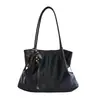 Moda coreana y japonesa simple de gran capacidad brillante 2026 nuevo bolso de hombro tipo tote de otoño para mujer con accesorios