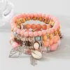 Artículo más vendido transfronterizo: Pulsera de Hilo Elástico Multicapa con Colgante de Hoja Hueca y Grano de Café, Estilo Bohemio