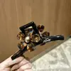 Pinza para el pelo de estrella con garra y estampado de leopardo estilo retro, dulce y fresca, para recogidos, pinza de acetato de gato y tiburón, accesorio de pelo elegante en forma de corazón
