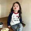 Camiseta infantil de manga longa com mangas raglan, nova coleção primavera e outono, top da moda para o início do outono para crianças, peça externa de algodão puro, camada base