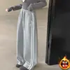 Pantalones de chándal para niña Otoño/Invierno 2026 Nuevos Casuales Estilo Coreano Niños Medianos/Grandes Plus Terciopelo Engrosados Rayados de Punto Modernos