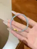 Pulsera de pez amarillo pequeño con baño de oro aguamarina no descolorible, pulsera de cuentas de cristal, accesorio de joyería versátil de lujo ligero para mujer