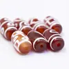 Cuentas dzi de ágata rojo con pátina de alto contenido de aceite de nueve ojos estilo Tíbet con contraste de color claro, cuentas sueltas con múltiples patrones, accesorios decorativos para pulseras al por mayor