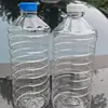 Botella de agua de vidrio para coche de 1,8 litros 2,0 litros botella de agua de vidrio 1,5 L PET botella de agua de plástico transparente botella de plástico