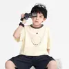 Camiseta de manga corta de marca de moda de verano para niños 2026 nueva ropa infantil para niños mayores, top fresco de manga media para street dance