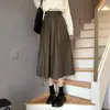 Saia Midi de Couro PU Cor Marrom Myerlard Plus Size Feminina Primavera Outono Inverno Gordas mm Cintura Alta Linha A Longa Meia Saia Saia Guarda-chuva Saia de Couro