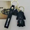 Llavero colgante de muñeca de Ninja Guerrero Negro de dibujos animados creativos transfronterizos, accesorios para llavero de bolso de pareja, llavero de coche
