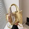 Bolso de nicho para mujer 2022 nuevo de moda otoño e invierno cesta de verduras para mujer estilo Chanel bolso de mensajero bolso cubo portátil