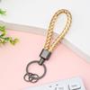 Llavero estilo creativo color pistola hebilla tejida boutique metal coche hombres y mujeres accesorios herrajes llavero Amazon