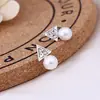 Pendientes de Botón Florales con Pedrería y Perlas Estilo Coreano para Venta Caliente en Mercados Callejeros para Mujeres, Pendientes Pequeños de Joyería Geométricos con Pedrería en Forma de Corazón, Acero Inoxidable