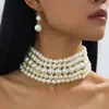 El Conjunto de Joyería de Collar de Perlas de Imitación Multicapa y Pendientes Más Vendido de Amazon Europa y América Retro Magnífico para Mujer
