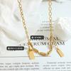 Nuevo collar minimalista exquisito con diseño de nicho, cadena de clavícula con resorte de empalme cuadrado de acero de titanio y metal.