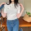 POLO cuello manga corta suéter corto 2024 Nuevo sentido de diseño elegante nicho corte ajustado adelgazante top versátil para mujeres