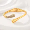 Pulseras Populares Transfronterizas Europeas y Americanas Ins Normcore Pulseras con Patrón de Onda Asimétrico Pulseras Metálicas Brillantes Joyería para Mujer