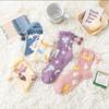 Calcetines de mujer de terciopelo medio sin pelusa para el hogar, con bola de mariposa, tubo de toalla, cálido y grueso terciopelo coral, para otoño e invierno.