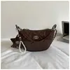 Bolsas de designer de nicho transfronteiriças para mulheres 2026 nova moda bolsa versátil com corrente bolsa tiracolo bolsa de bolinho requintada super popular