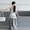 Conjunto de Chaleco de Punto Calado en Capas Relajadas para Niñas Verano 2026 Conjunto de Tres Piezas de Camisola Calada para Niños Medianos y Grandes