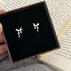 Pendientes de moda con forma de estrella y lazo, pequeños y únicos, elegantes, con un diseño dulce y femenino.