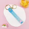 Llavero Colgante de Cordón de Cuero con Letra Transparente Brillante con Accesorios Estilo Muñeca Rellena de Aceite Encanto de Llavero Pulsera Venta al por Mayor