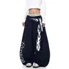 Pantalones deportivos blancos de estilo americano retro con estampado de llamas, cintura con cinturón desmontable, pierna curva para mujer, pantalones anchos de corte holgado para danza jazz