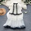 Falda de malla con lunares de estilo francés, suave, de cintura alta, línea A para mujer, falda abullonada multicapa, nuevo modelo Otoño 2026