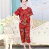 Pijama de algodón seda floral casual para mamá a la moda, traje holgado transpirable de cuello redondo y manga corta con pantalones capri, se puede usar en el exterior