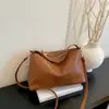 Otoño 2026 Nuevo Bolso Minimalista de Lujo Ligero Tejido para el Hombro Bolso de Mano de Moda Superficie Suave para Viajar al Trabajo al por Mayor Bolso de Mujer
