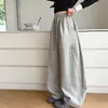 Calça Jeans Feminina com Rebites e Barra Curva 2026 Novidades de Outono Calças Casuais Esportivas para Crianças de Tamanho Médio e Grande Calças de Perna Larga Calças de Moletom Largas Calças Longas