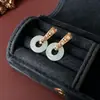 Aretes Colgantes de Gancho Redondos con Gota de Aceite Mariposa Oro Arena 18K Nuevos Chinos Elegantes de Moda Versátiles Pendientes de Nicho de Gama Alta