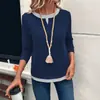 Otoño 2026 Nuevo Amazon Europeo y Americano TK Camiseta Casual de Moda de Manga Larga para Mujer con Cuello Redondo Falso Dos Piezas con Empalme