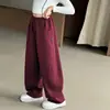 Calça de moletom para meninas 2026 Outono/Inverno Calças de campus para crianças maiores calças compridas de malha soltas estilosas calças esportivas para meninas