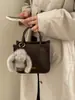 Bolso Versátil de Diseño de Nicho Elegante para Mujer Modelo Nuevo 2026 Alta Estética Ligero Simple para Viajar al Trabajo Bolso de Hombro Cruzado