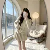 Conjunto de tricô cáqui para mulheres, novo look de inverno, um conjunto de duas peças composto por um top e uma saia