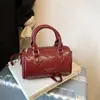 Bolsa de Mão Estilo Coreano Moda Almofada 2026 Nova Verão Versátil Retro Bolsa Transversal Texturizada Elegante Bolsa Cilindro Redondo