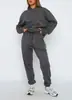 Traje de mujer nuevo de primavera, otoño e invierno transfronterizo europeo y americano, moda deportiva con logotipo, suéter de manga larga con capucha, traje de dos piezas