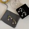 Pendientes de Estrella de Ocho Puntas, Diseño de Nicho de Alta Gama, Pendientes de Lujo Ligero, Pendientes Colgantes Traseros, Pendientes Nuevos Versátiles y de Moda