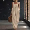 Macacão de Moda Casual Novo Cruzado Europeu e Americano Primavera e Verão 2026, Cor Sólida Solto e Confortável com Bolsos, Macacão de Alça Estiloso Feminino
