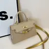2025 Nuevo Bolso Kelly de Moda Estilo Ins Chica Viajera Versión Coreana Bolso de Hombro Bolso de Mano Versátil a la Moda Bolso Cruzado