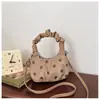 Bolsa de mão requintada em formato de nuvem com bolinhas para mulheres, nova bolsa estilo coreano em formato de bolinho 2026, versátil, moderna e doce, bolsa de ombro/transversal