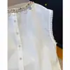 Camisa sin mangas de algodón y lino amarillo estilo bohemio para mujer Verano 2025 Holgada con conchas Cuello redondo Blusa de lino Top
