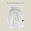 Calça de Moletom Esportiva Lisa para Bebê Menino Primavera e Outono Estilo Coreano Infantil Cintura Elástica com Punho Calça Casual Solta para Bebê