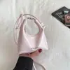 Bolsa Pequena de Mão para Mulheres Estilo Coreano para Comércio Exterior, Nova Moda Primavera 2026 Bolsa de Ombro Único Transversal, Bolsa Estilosa de Dumpling para Mulheres