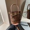 Bolso de Cubo Portátil para Mujer Estilo Coreano Primavera Nuevo Moda de Alta Gama Combinable Bolso de Hombro 2025 Diseño Nicho Bolso para Mujer