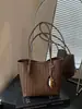 Bolso de mano tejido de patrón de nicho estilo coreano ins, bolso cesta de moda de gran capacidad, bolso de hombro y axila texturizado de moda