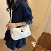 Bolso cruzado simple de estilo literario para mujer, al por mayor spot transfronterizo, bolso de hombro versátil estilo perezoso, diseño de nicho para ir al trabajo