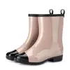 Botas de lluvia impermeables y antideslizantes de nueva moda transfronterizas, botas de lluvia de gelatina para mujer, botas de agua, zapatos de agua de algodón cálidos para adultos