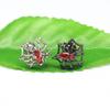 Pendientes de tuerca con araña europea y americana transfronterizos, pendientes de tuerca para el lóbulo de la oreja con circón rojo, pendientes de telaraña de acero inoxidable en stock