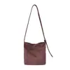 Bolsa balde estilo japonês para mulheres, nicho da moda coreana casual simples 2026 outono bolsa de ombro transversal para verão