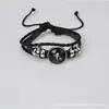 Botones de presión con cuentas suministrados directamente Pulsera de cuero de vaca luminosa de las Doce Constelaciones Pulsera tejida a mano de cuero tejida a mano para pareja